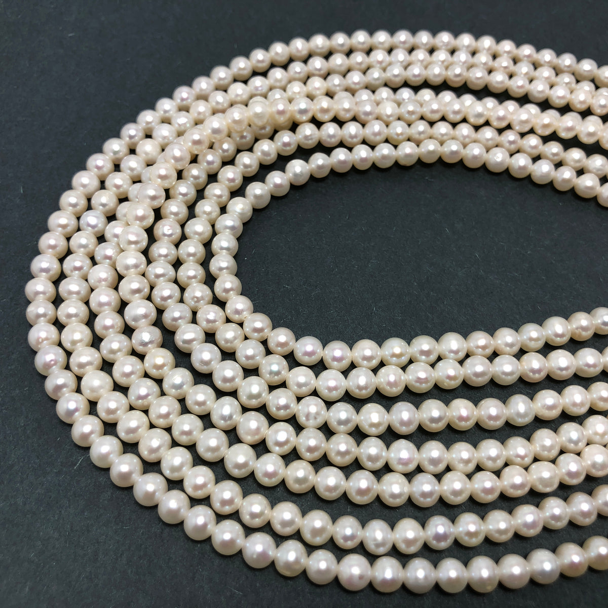 Freshwater Cultured 6–6.5mm Semi-Round Pearl Strand White AA-Grade